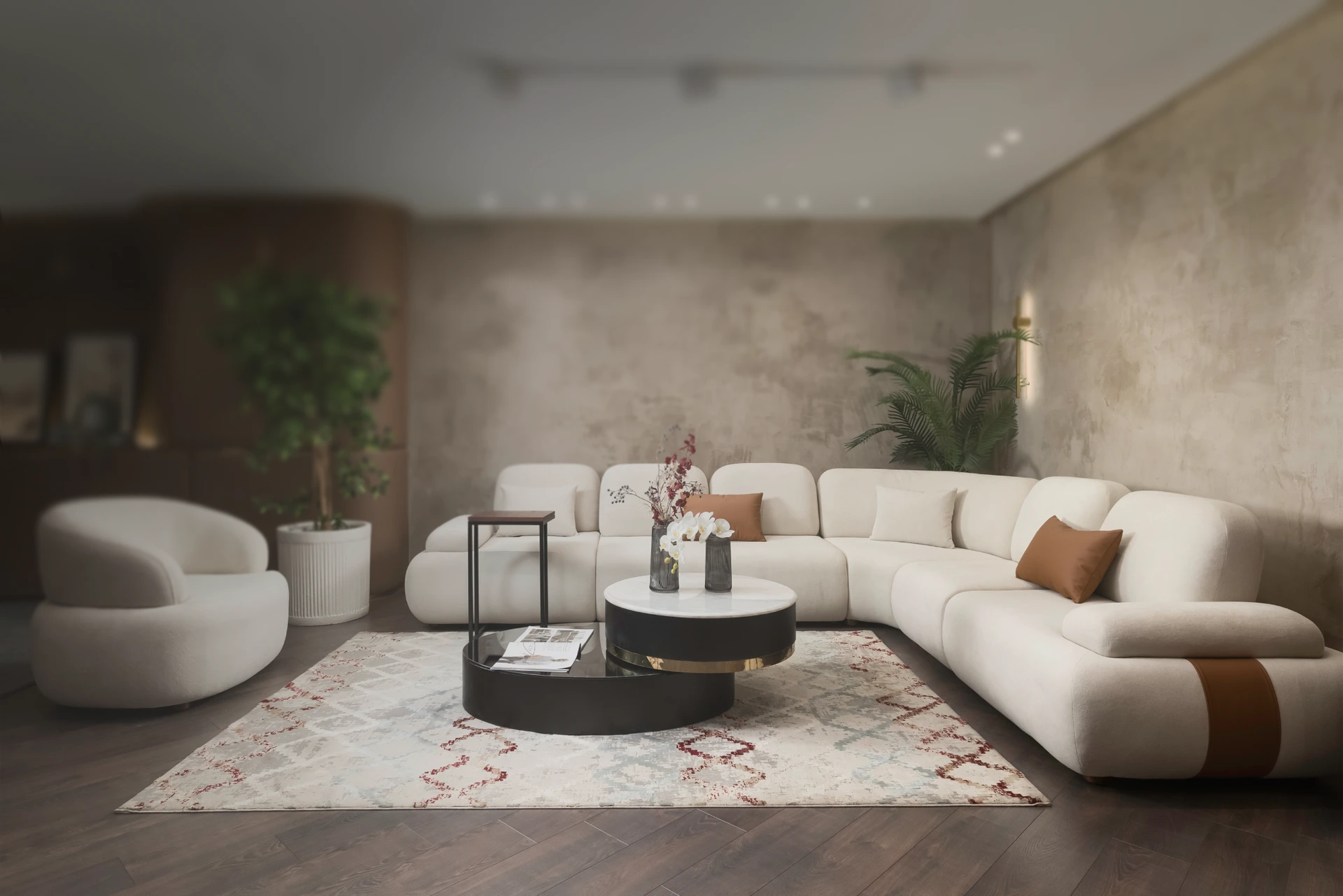 Oyma living room with a curved sofa